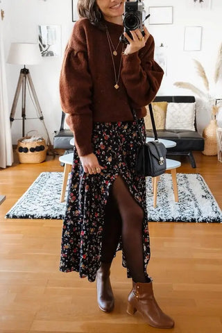 une femme en robe longue avec des collants en hiver